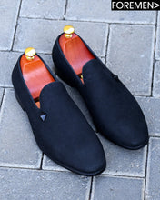 Black loafers